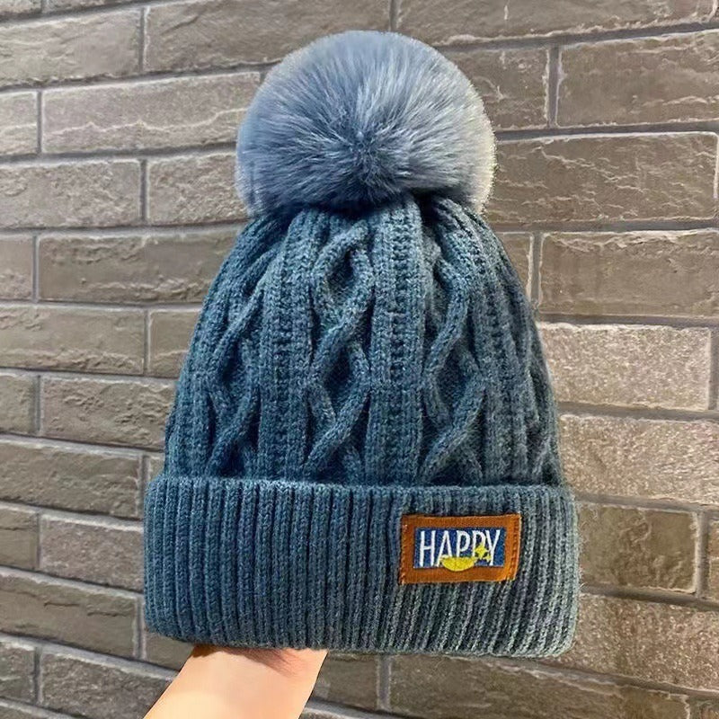 Happy Pom Cable Knit Beanie