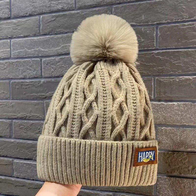 Happy Pom Cable Knit Beanie