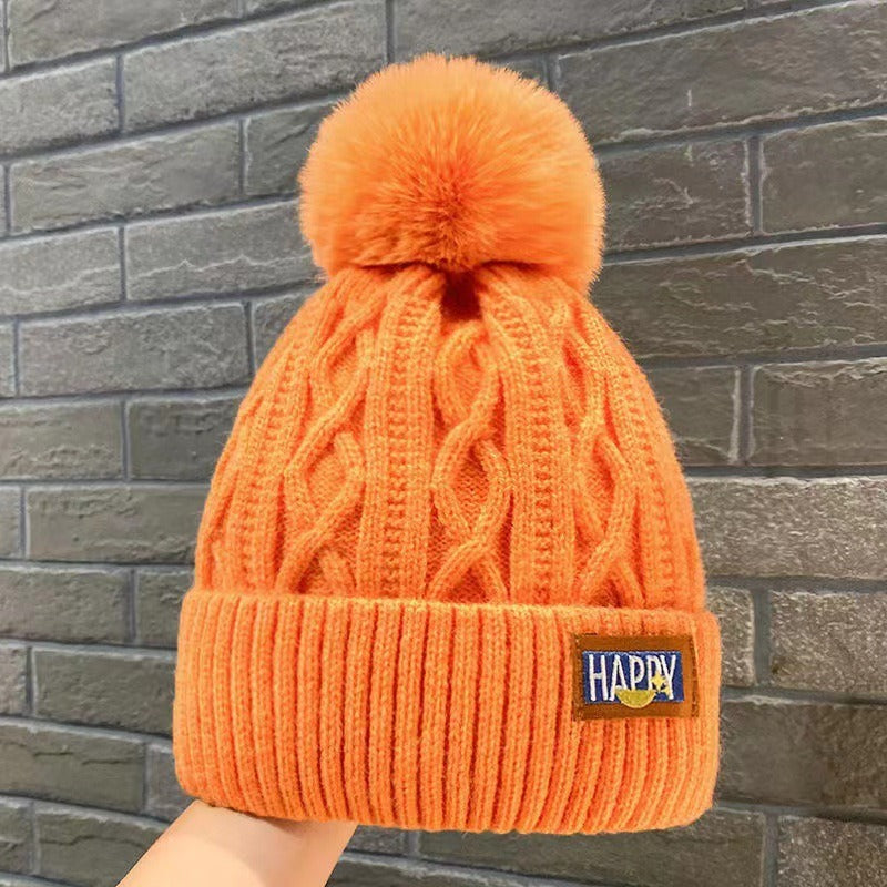 Happy Pom Cable Knit Beanie